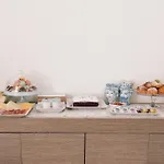 Alludo לינה וארוחת בוקר